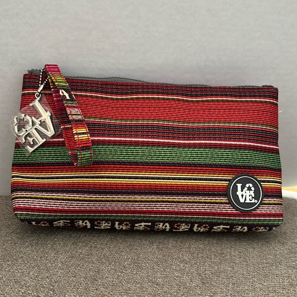 Lovebags brand cosmetics bag. New. Colorful. Nylon material. Zipper closure.